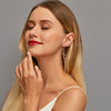 Fashion Waves Plating Alloy Artificial Gemstones Drop Earrings