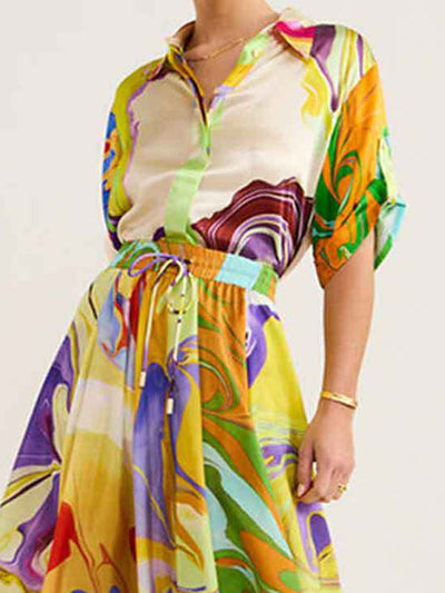 Loose Asymmetric Printed Lapel Blouse + A-Line Drawstring Elasticity Skirt Two Pieces Set