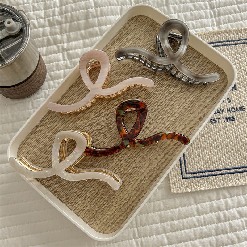 Women's Simple Style Waves Acetic acid sheets Metal Hair Claws