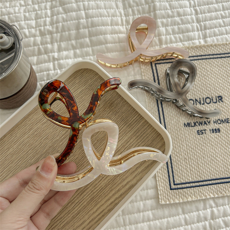 Women's Simple Style Waves Acetic acid sheets Metal Hair Claws