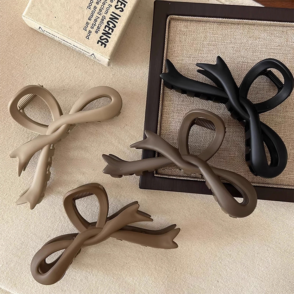 Women's Simple Style Bow Knot Arylic Hollow Out Hair Claws