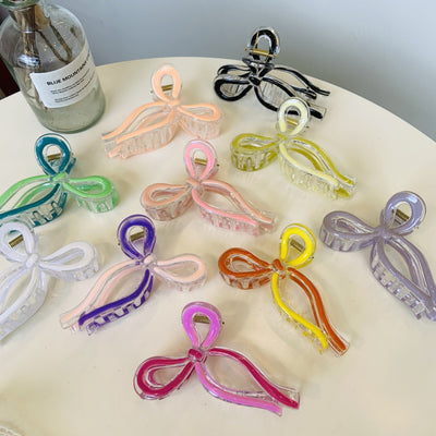 Women's Simple Style Bow Knot Plastic Resin Polishing Hair Claws