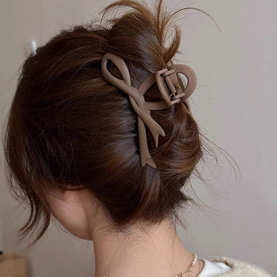 Women's Simple Style Bow Knot Arylic Hollow Out Hair Claws