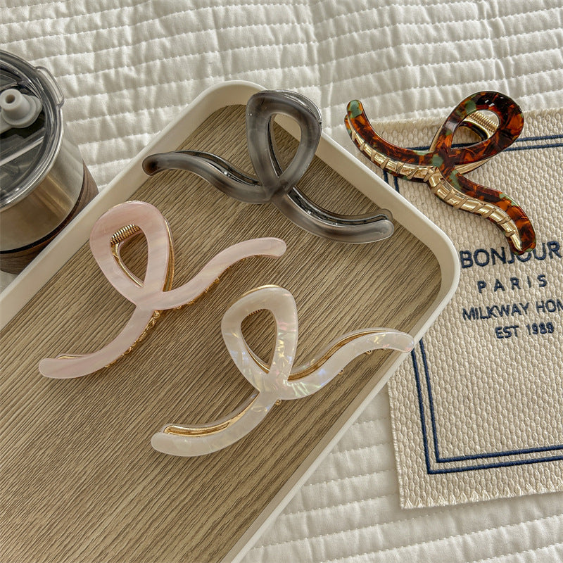 Women's Simple Style Waves Acetic acid sheets Metal Hair Claws