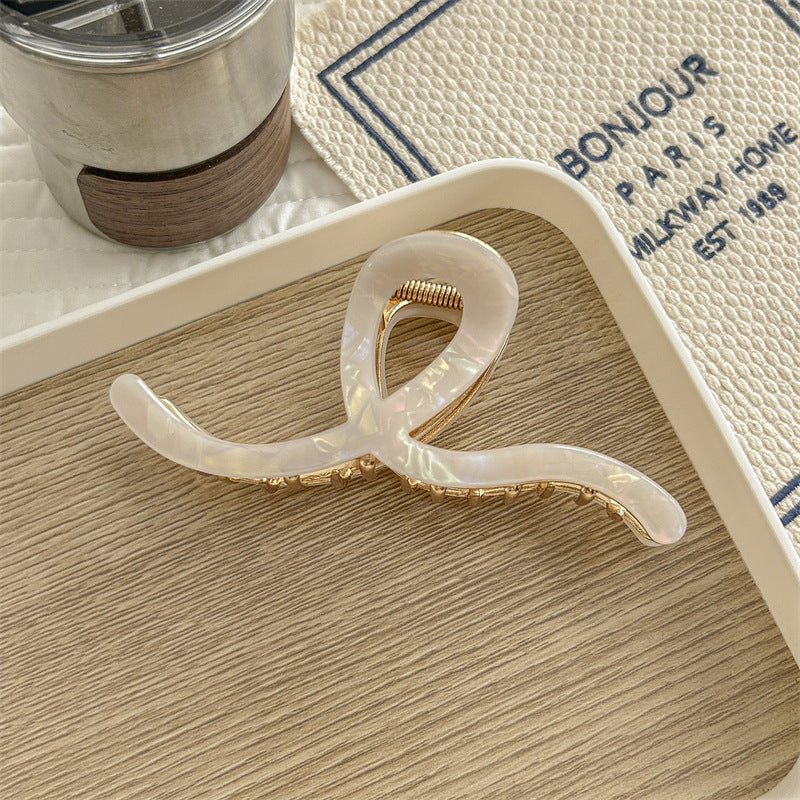 Women's Simple Style Waves Acetic acid sheets Metal Hair Claws