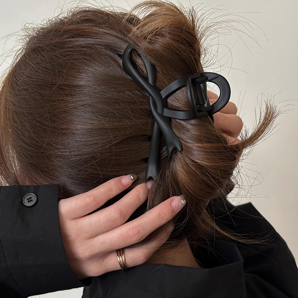 Women's Simple Style Bow Knot Arylic Hollow Out Hair Claws