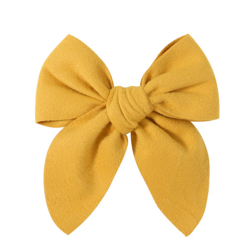 sweet solid color polyester bow knot hair clip