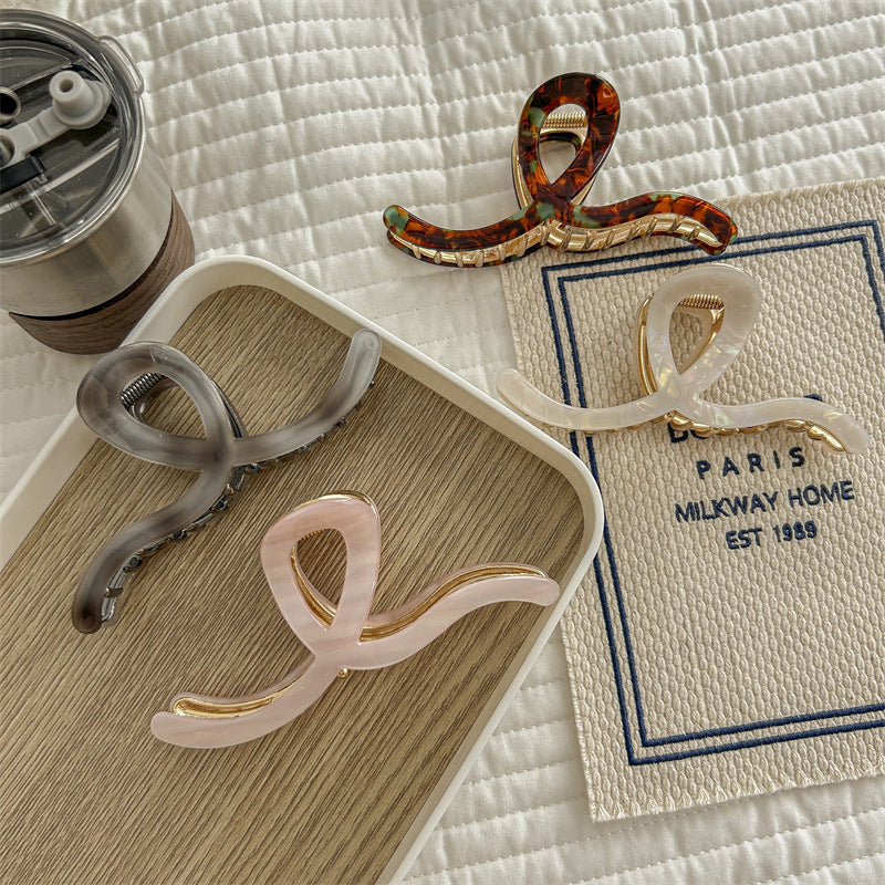 Women's Simple Style Waves Acetic acid sheets Metal Hair Claws