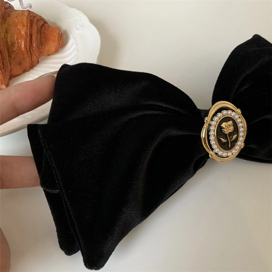 women's simple style flower alloy flannel bowknot artificial pearls hair clip