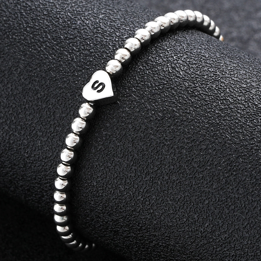 Europe and America Cross Border Hot Sale Creative 26 Letters round Beads Heart-Shaped Copper Bracelet Fashion Ins Simple Beaded Elastic Bracelet
