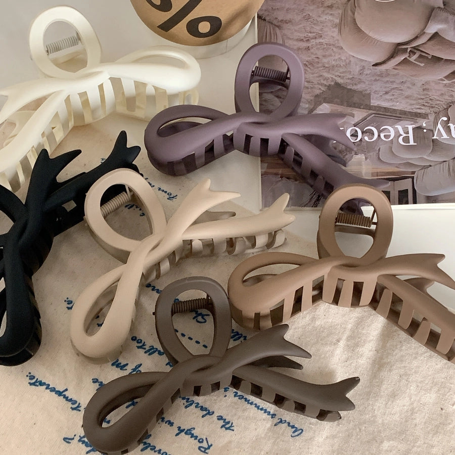 simple style bow knot plastic hair claws