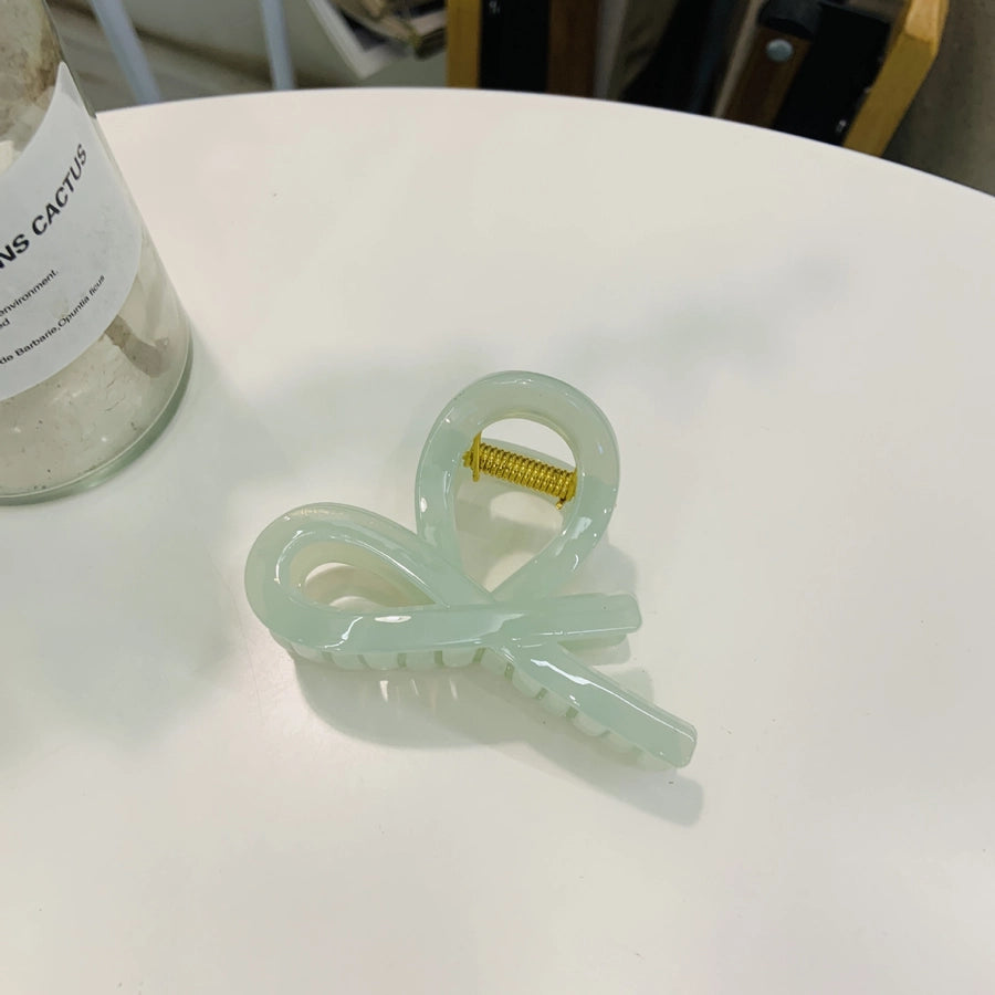 Women's Simple Style Bow Knot Plastic Resin Polishing Hair Claws