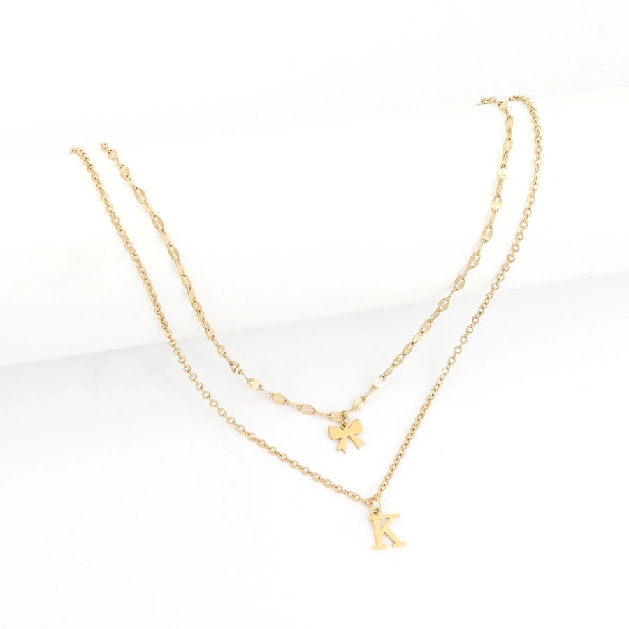 Jewelry Elegant Simple Style Classic Style Letter Bow Knot 201 Stainless Steel 304 Stainless Steel Pendant Necklace