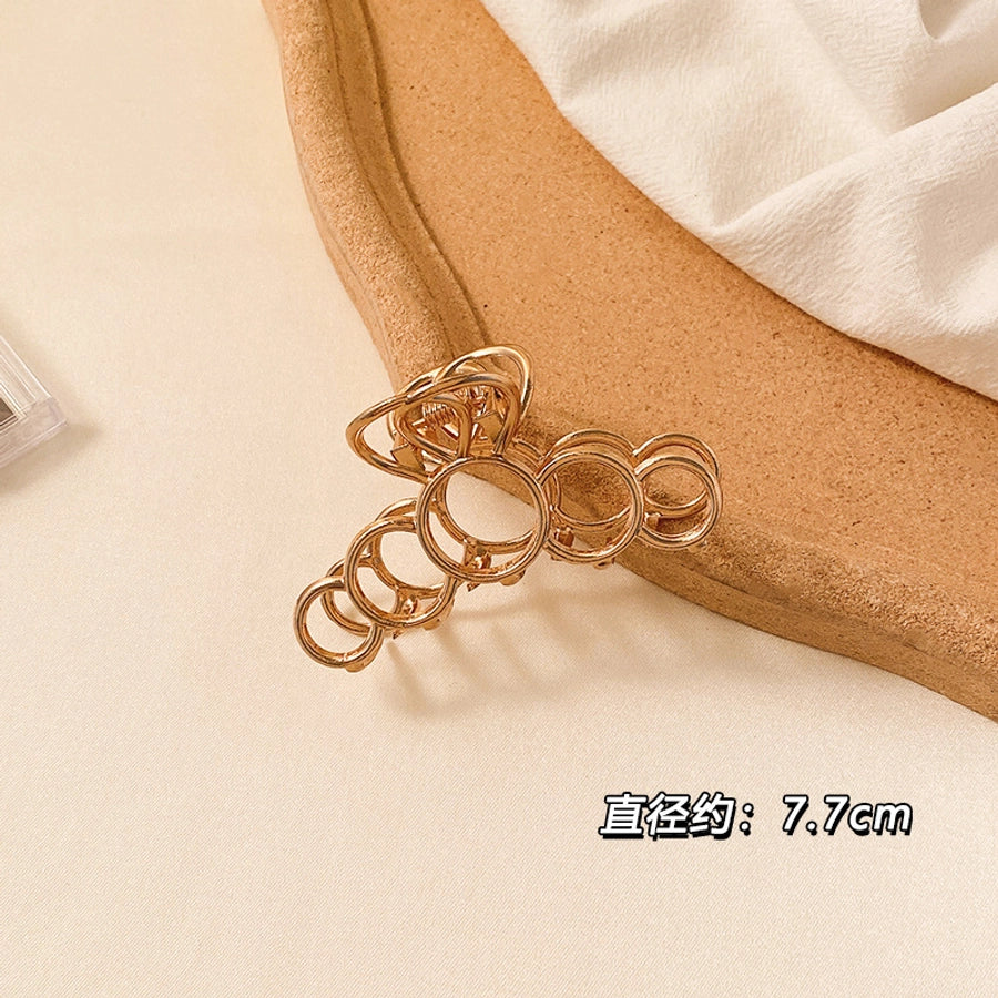 simple style solid color alloy resin hollow out hair claws