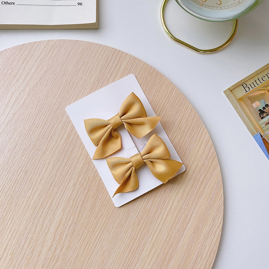 Girl'S Simple Style Classic Style Bow Knot Cloth Braid Hair Clip