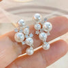1 pair elegant simple style streetwear flower bow knot plating inlay alloy artificial pearls zircon ear studs