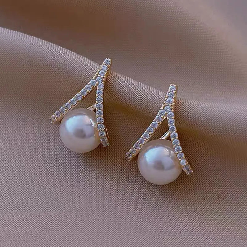 1 pair elegant simple style streetwear flower bow knot plating inlay alloy artificial pearls zircon ear studs