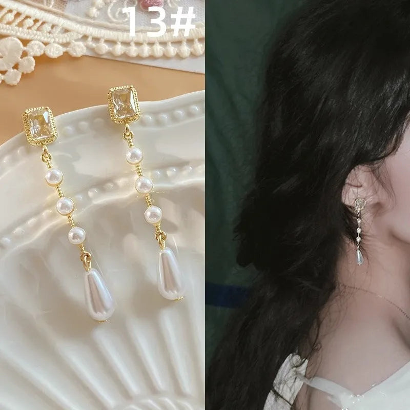 French retro earrings women's temperament earrings high-end feeling mosquito-repellent incense plate ear clip women's No ear hole pearl earrings women's wholesale