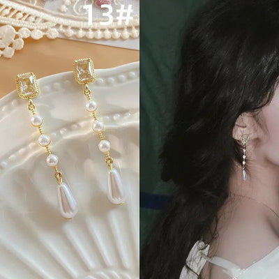 French retro earrings women's temperament earrings high-end feeling mosquito-repellent incense plate ear clip women's No ear hole pearl earrings women's wholesale