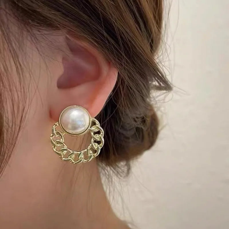 1 pair elegant simple style streetwear flower bow knot plating inlay alloy artificial pearls zircon ear studs