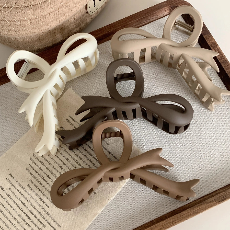 simple style bow knot plastic hair claws