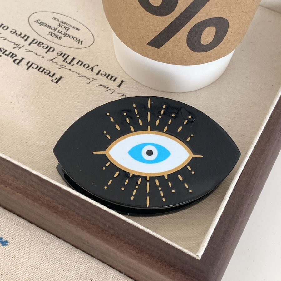 exaggerated funny devil's eye acetic acid sheets hair claws