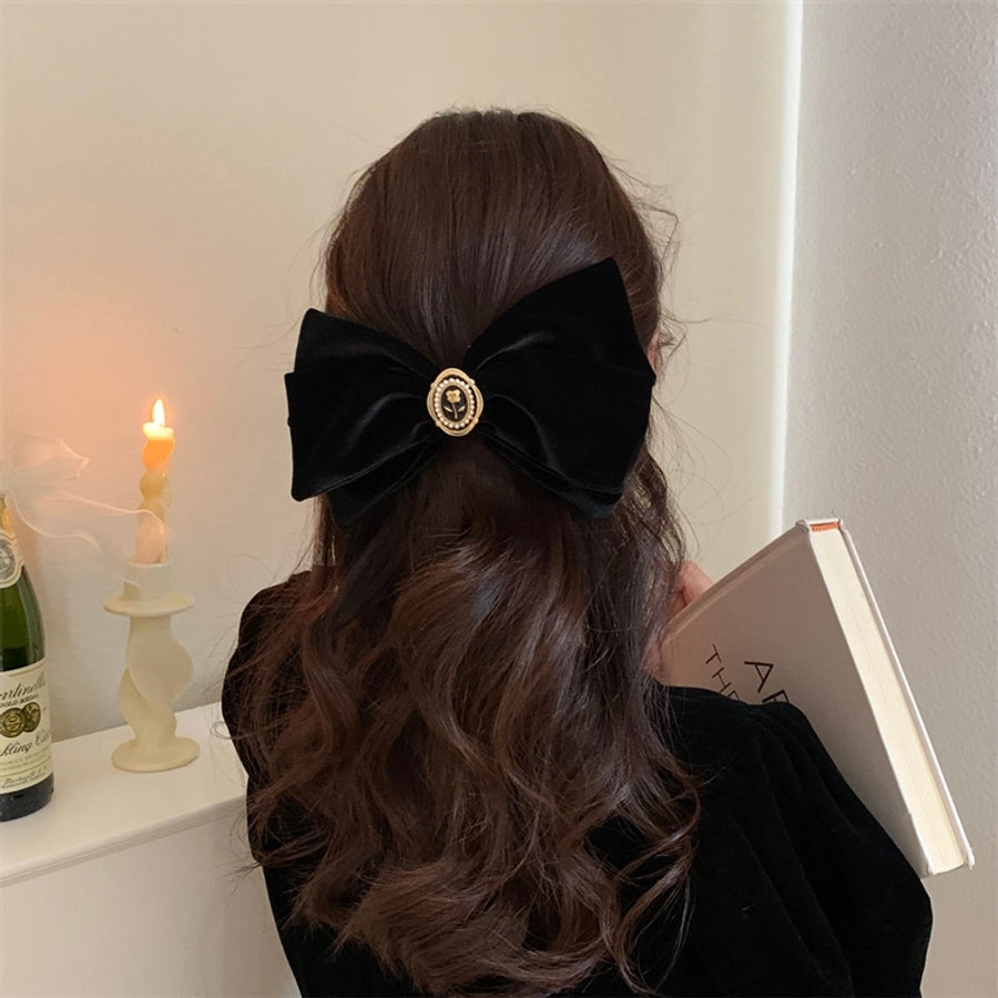 women's simple style flower alloy flannel bowknot artificial pearls hair clip