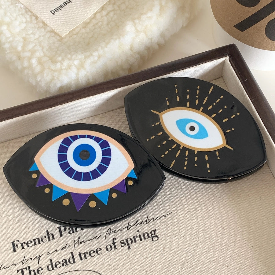 exaggerated funny devil's eye acetic acid sheets hair claws