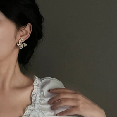 Light luxury high-grade butterfly mosquito coil ear clip without pierced women's super flash Mori style fresh earrings summer fashion