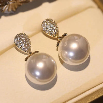1 pair elegant simple style streetwear flower bow knot plating inlay alloy artificial pearls zircon ear studs