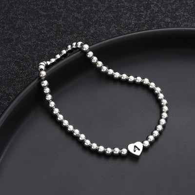 Europe and America Cross Border Hot Sale Creative 26 Letters round Beads Heart-Shaped Copper Bracelet Fashion Ins Simple Beaded Elastic Bracelet