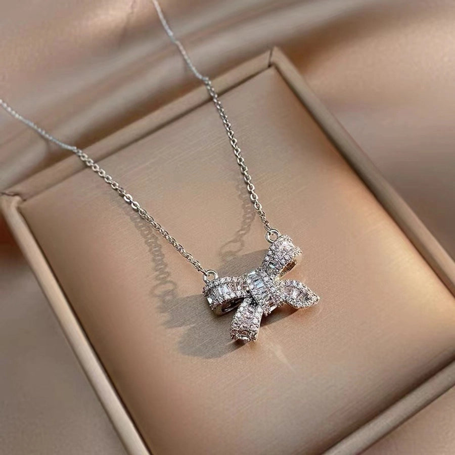 Jewelry Simple Style Bow Knot Titanium Steel Zircon Inlay Pendant Necklace