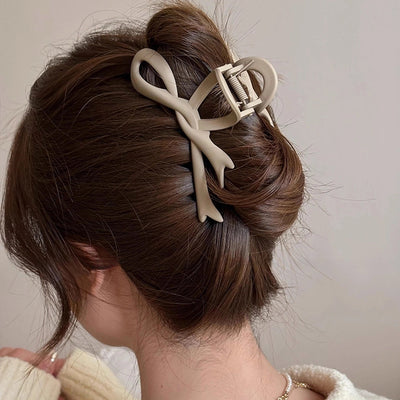 Women's Simple Style Bow Knot Arylic Hollow Out Hair Claws