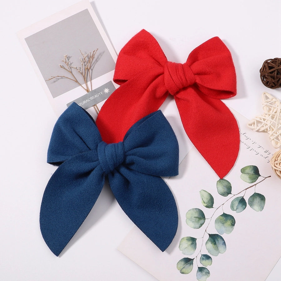 sweet solid color polyester bow knot hair clip
