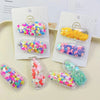 cartoon style heart shape flower plastic hair clip