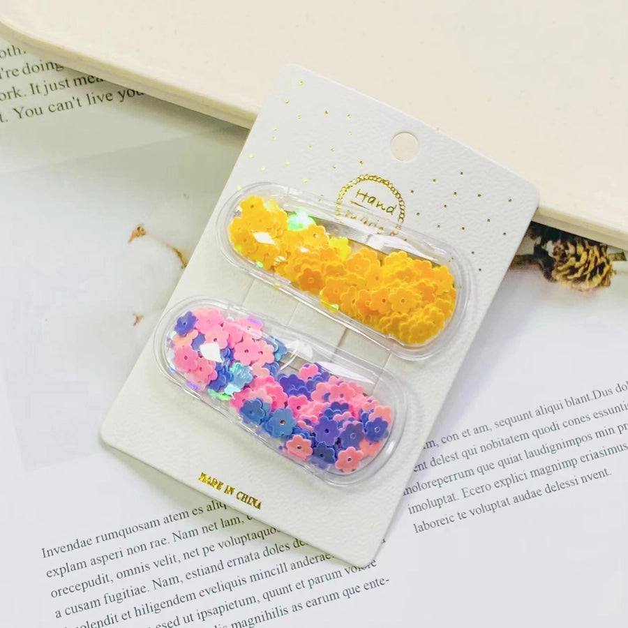 cartoon style heart shape flower plastic hair clip