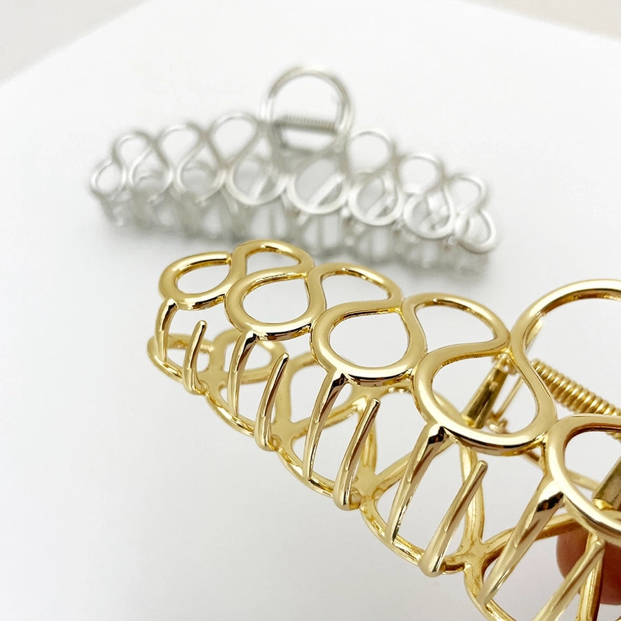 Women's Elegant Simple Style Solid Color Alloy Hollow Out Hair Claws