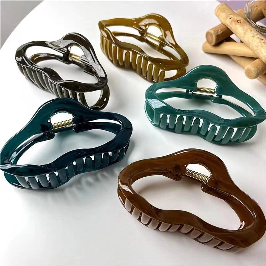 simple style irregular solid color plastic resin hollow out hair claws