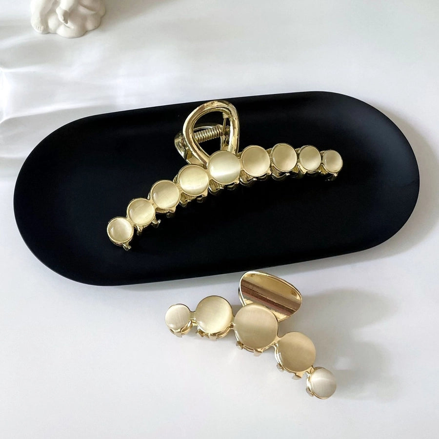 casual simple style round crown solid color metal inlay pearl hair claws