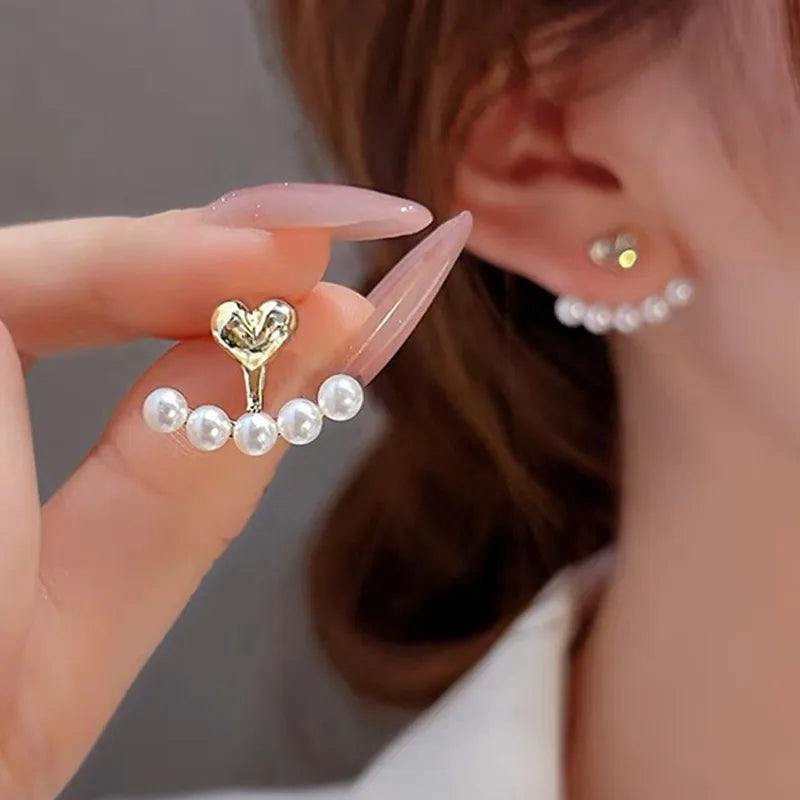 1 pair elegant simple style streetwear flower bow knot plating inlay alloy artificial pearls zircon ear studs