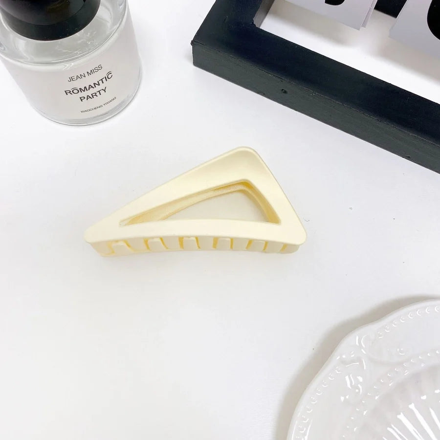 women's simple style triangle plastic hair claws