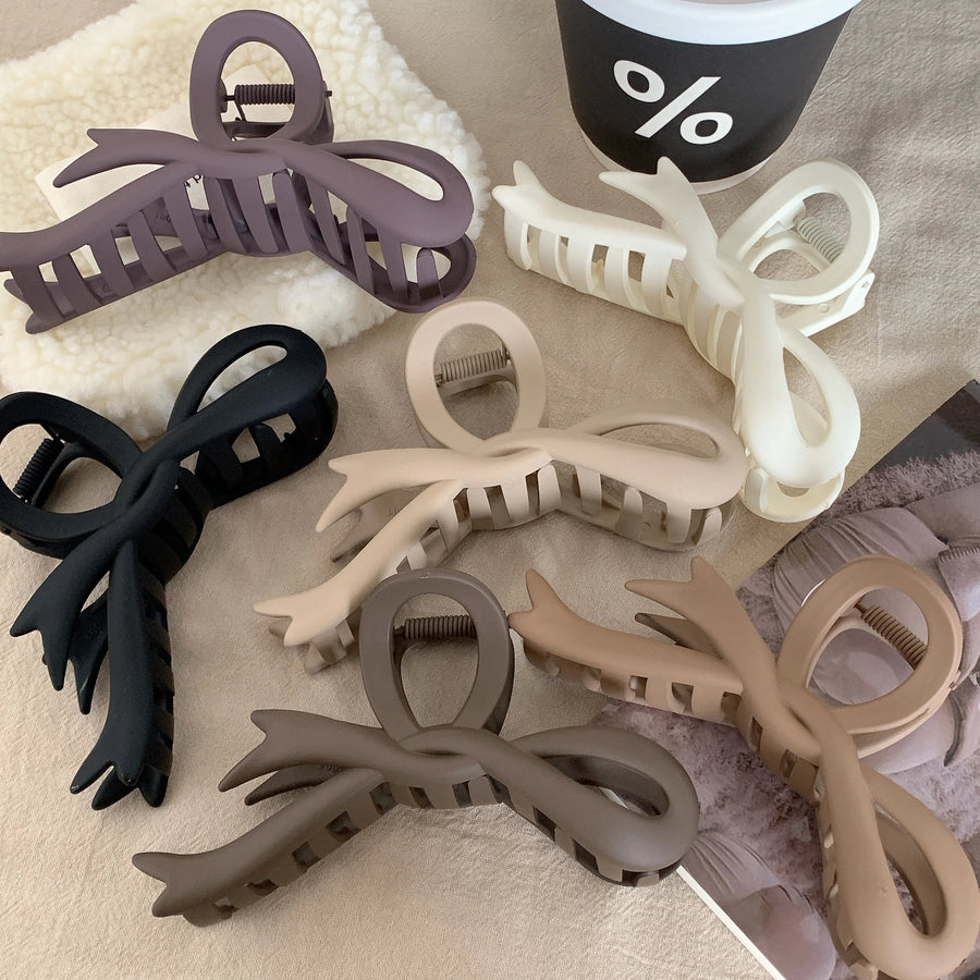 simple style bow knot plastic hair claws