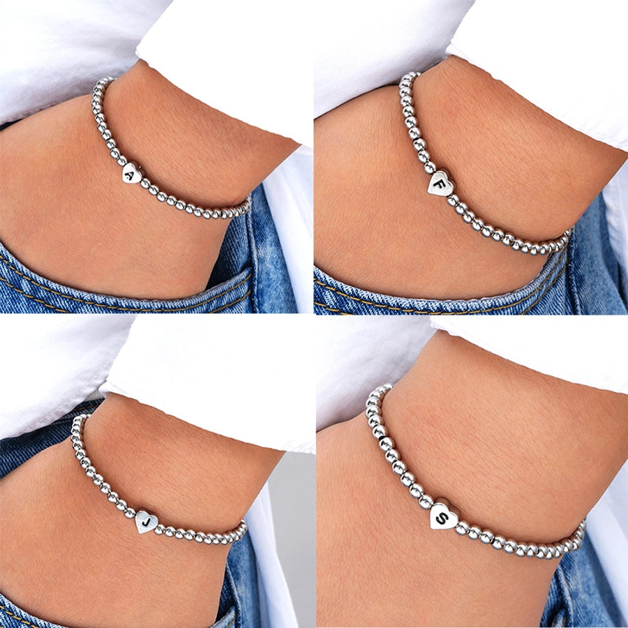 Europe and America Cross Border Hot Sale Creative 26 Letters round Beads Heart-Shaped Copper Bracelet Fashion Ins Simple Beaded Elastic Bracelet