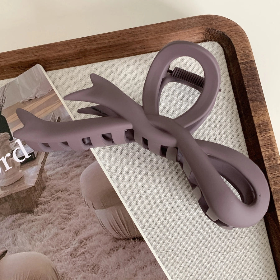 simple style bow knot plastic hair claws