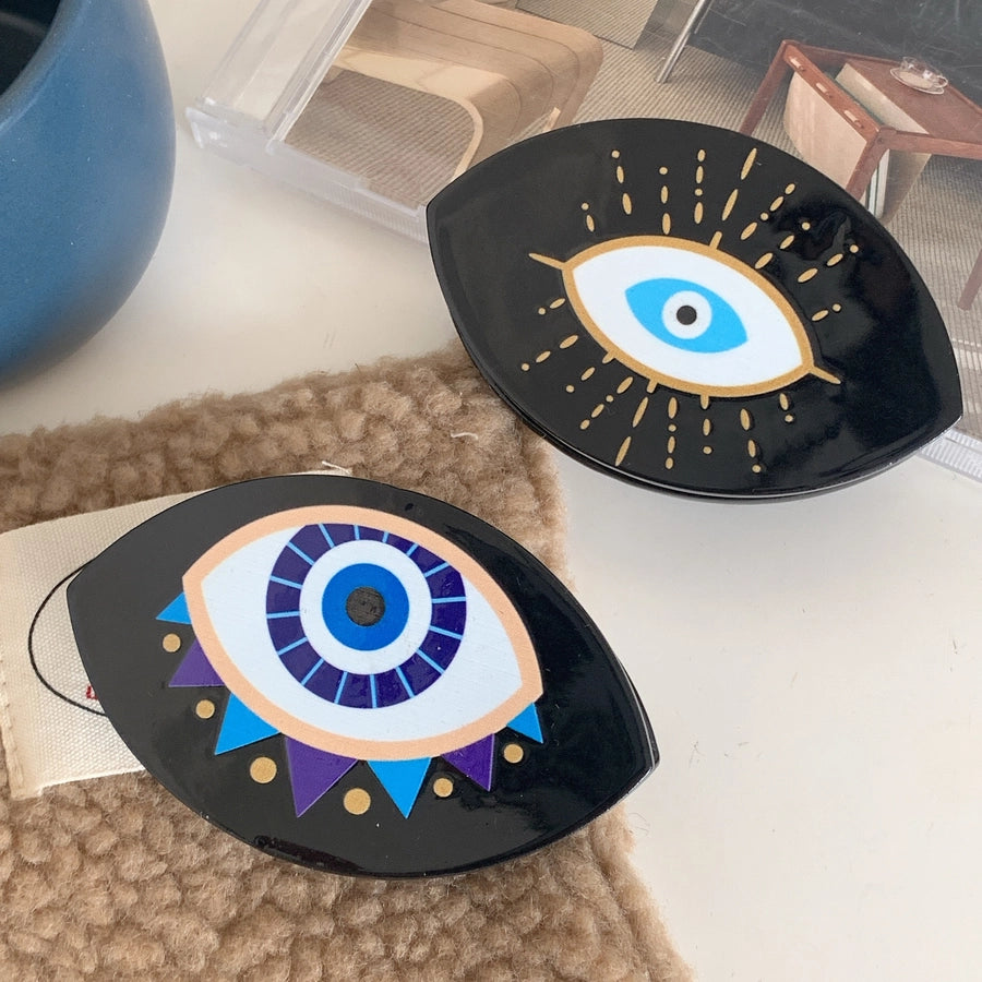 exaggerated funny devil's eye acetic acid sheets hair claws