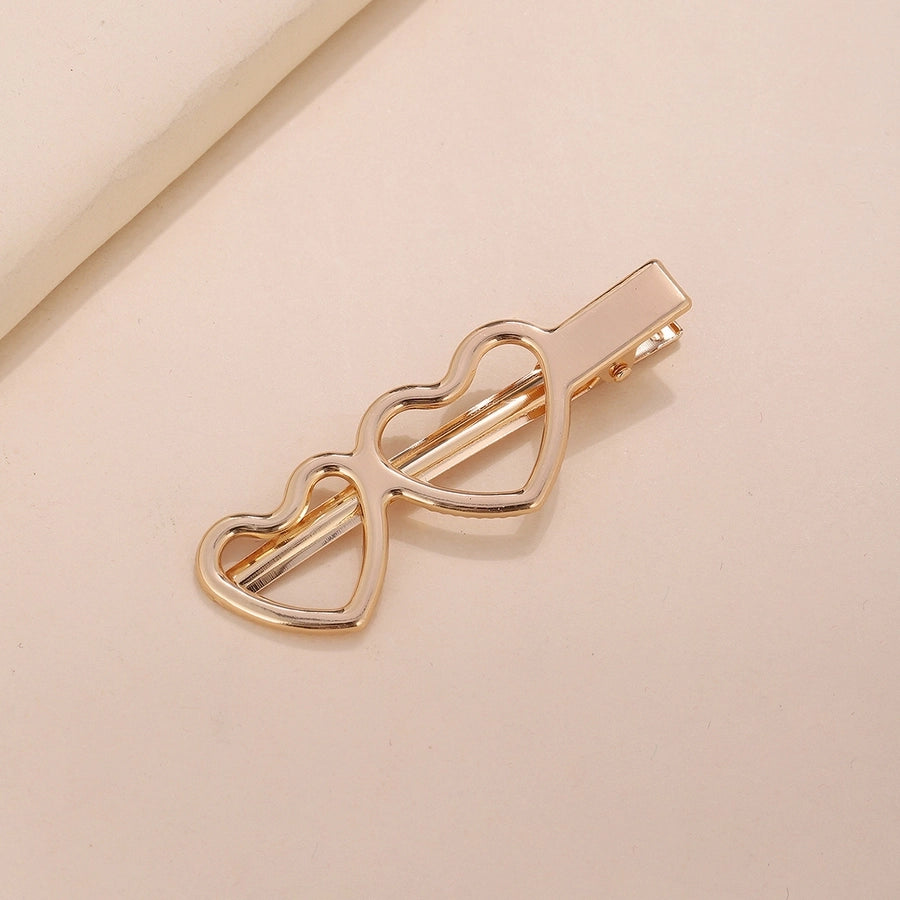 women's simple style heart shape cat bow knot alloy plating hair clip