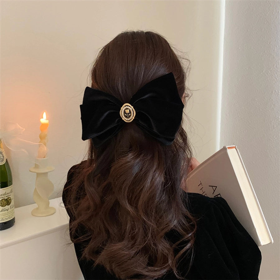 women's simple style flower alloy flannel bowknot artificial pearls hair clip
