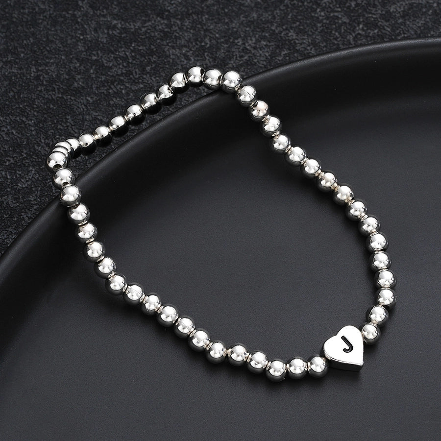 Europe and America Cross Border Hot Sale Creative 26 Letters round Beads Heart-Shaped Copper Bracelet Fashion Ins Simple Beaded Elastic Bracelet