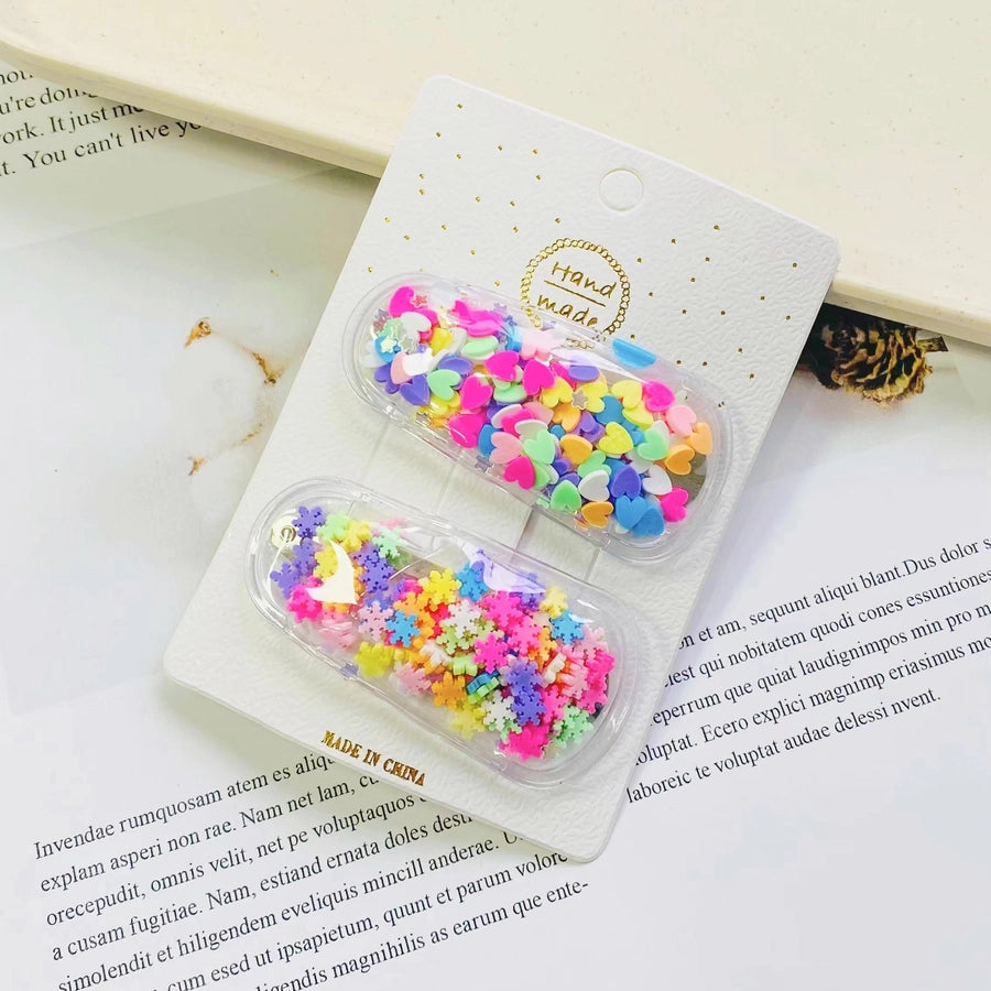 cartoon style heart shape flower plastic hair clip