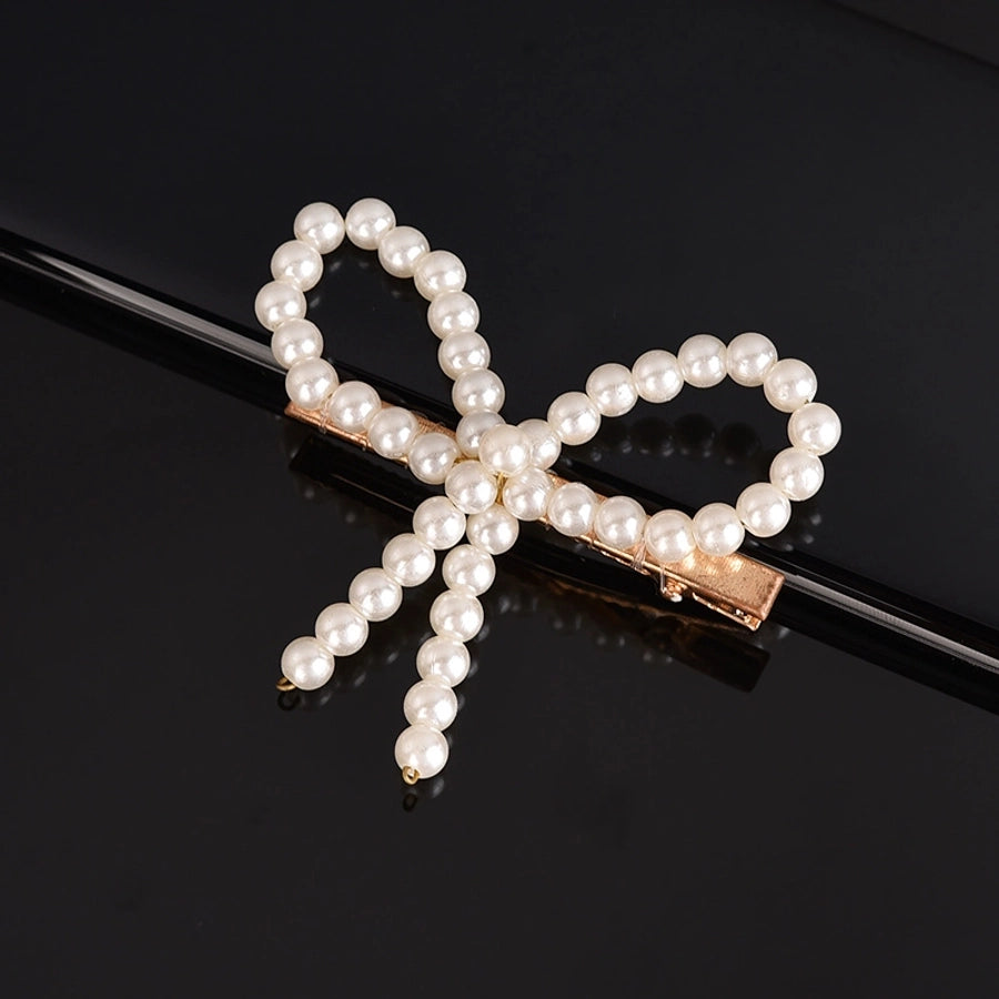 simple style geometric bow knot imitation pearl alloy plastic hair clip 1 piece